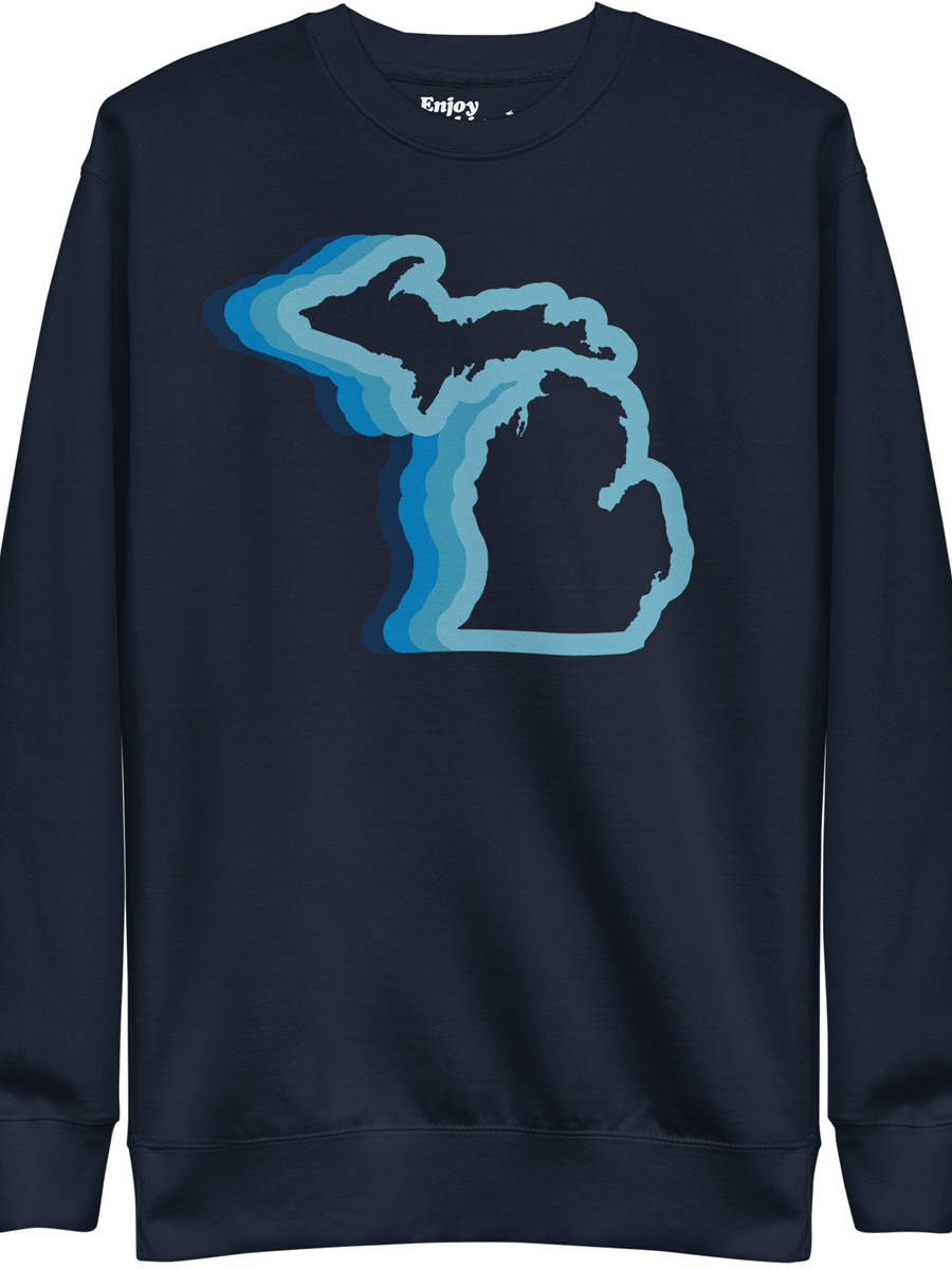 Michigan 70's Premium Sweatshirt shown in navy with a blue color wave of the state of Michigan. By Enjoy Michigan