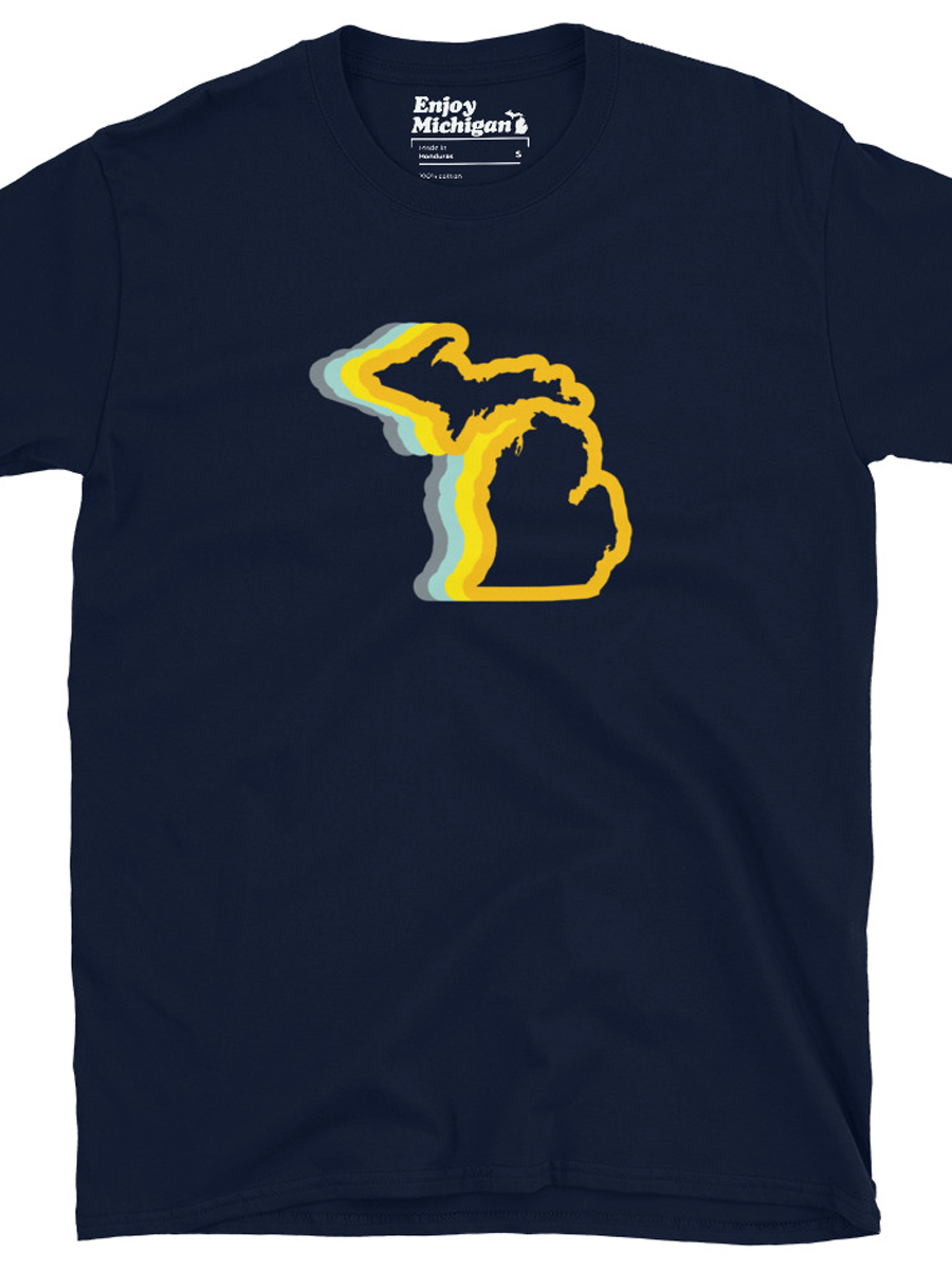 Michigan 70's Relaxed Fit Premium T-shirt shown in navy with a gold and blue graphic of the state of Michigan printed on the front. By Enjoy-Michigan