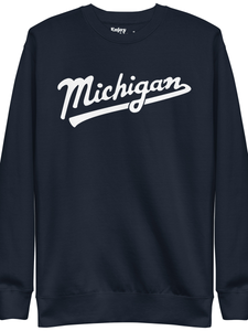 Michigan Script premium sweatshirt shown in navy with a white sport-style script graphic printed on the front. By Enjoy Michigan