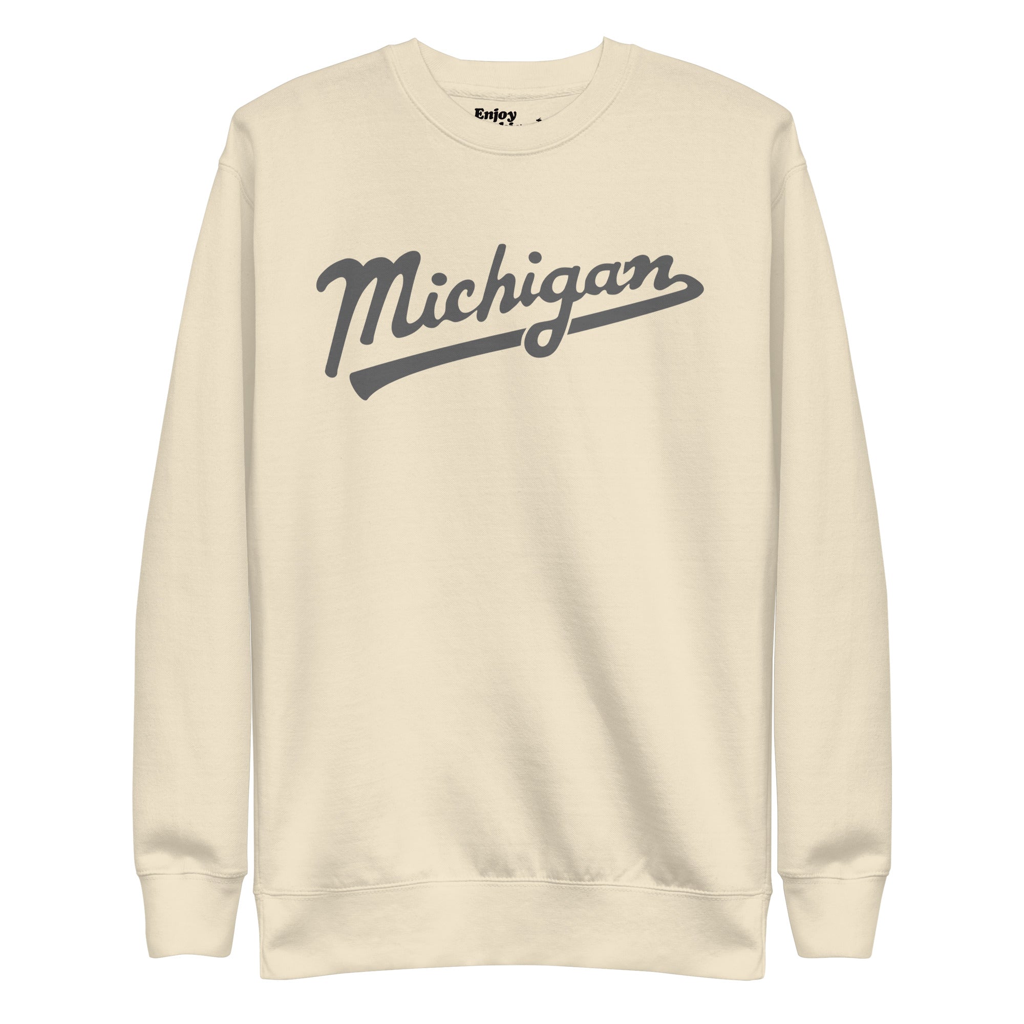 Michigan Script premium sweatshirt shown in cream with a gray sport-style script graphic printed on the front. By Enjoy Michigan