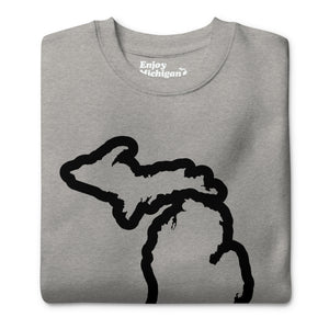 Michigan Outline premium sweatshirt shown in carbon gray with a black graphic out line of the state of Michigan printed on the front. By Enjoy Michigan