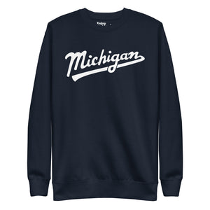 Michigan Script premium sweatshirt shown in navy with a white sport-style script graphic printed on the front. By Enjoy Michigan