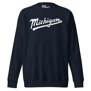 Michigan Script premium sweatshirt shown in navy with a white sport-style script graphic printed on the front. By Enjoy Michigan
